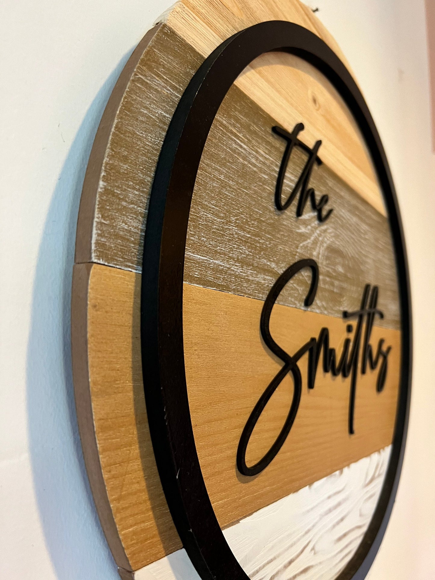 Round wood family name wall sign, 3D Shiplap Modern Door Hanger with black ring, Minimalist design